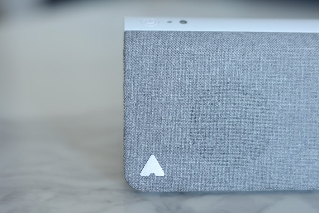 Close-up of Kevin fabric front panel and top controls on marble